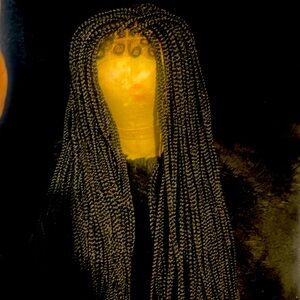 Long braided Lacefront wig with baby hairs. Synthetic black.